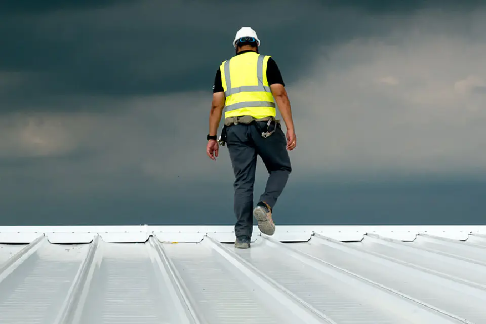 Worker on roof